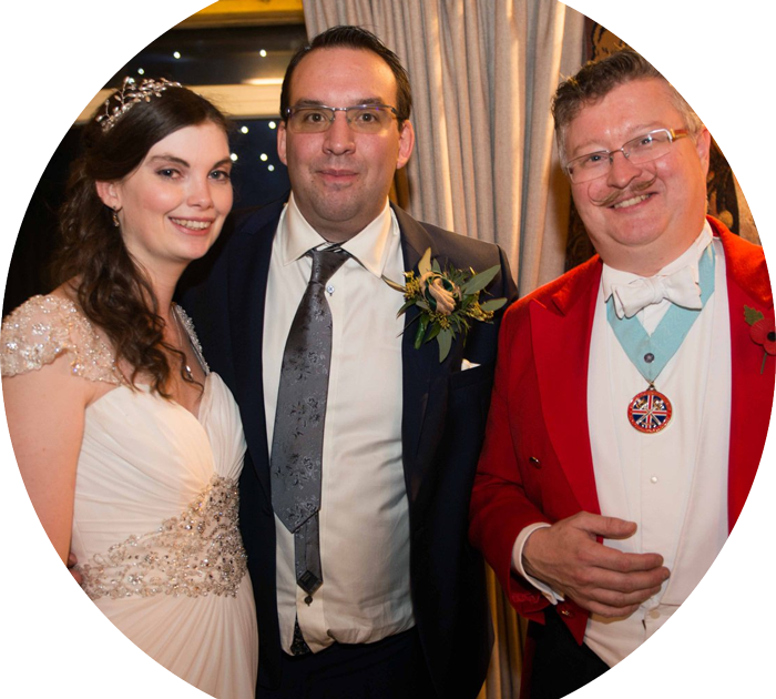 Toastmaster with wedding couple